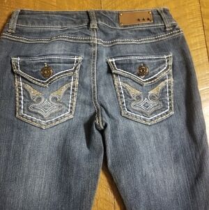 Pink stretch bootcut jeans size 3